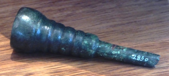 The mouthpiece of a Roman horn.